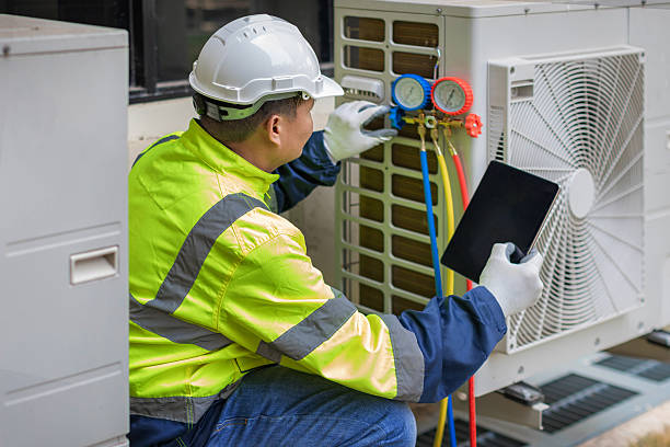 Professional Heat Pump Repair technician working in Flat Rock, IN